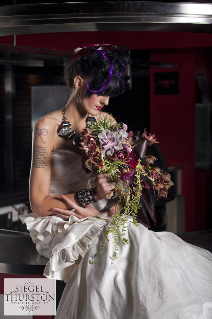 bridal portraits on a modern stainless steel bar
