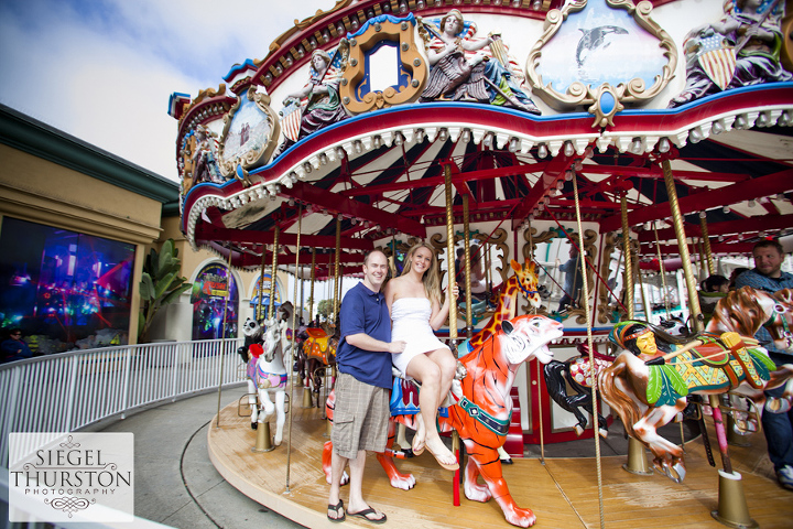 engagement photos at the mission beach carousel