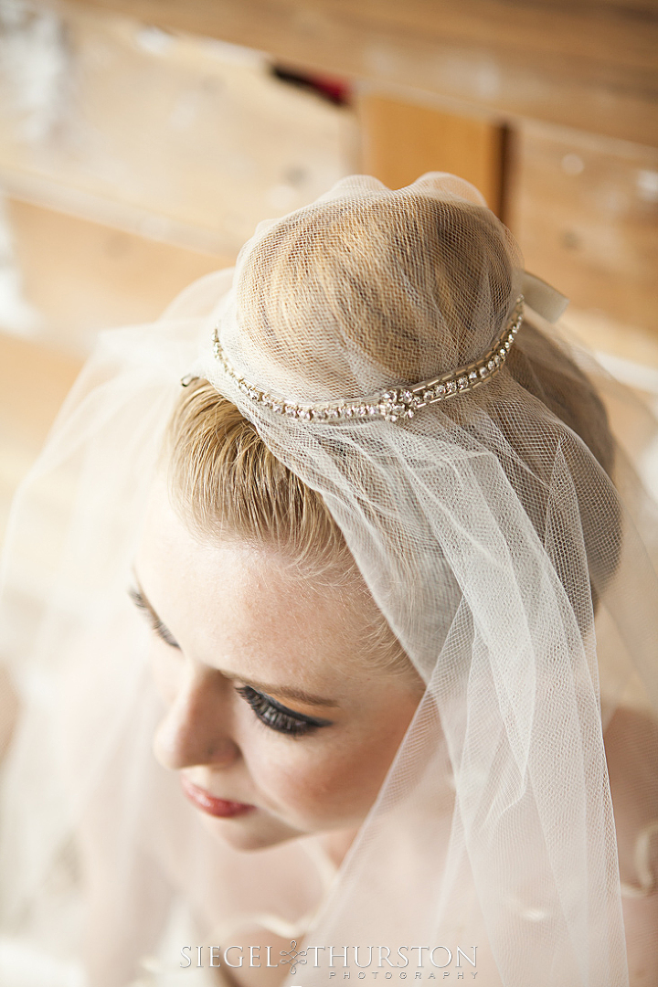 up due wedding hair style with a veil