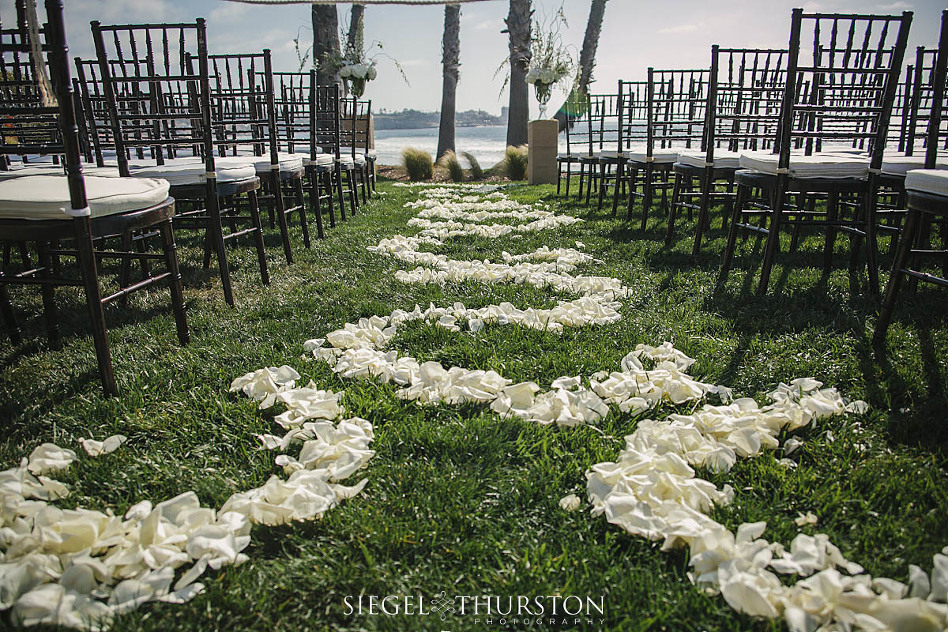 white flower petal aisle design