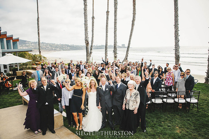 A group shot of all the wedding party and guests