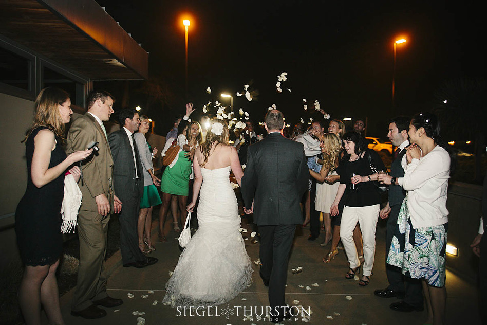 Rose petals make for a wonderful send-off for the bride and groom