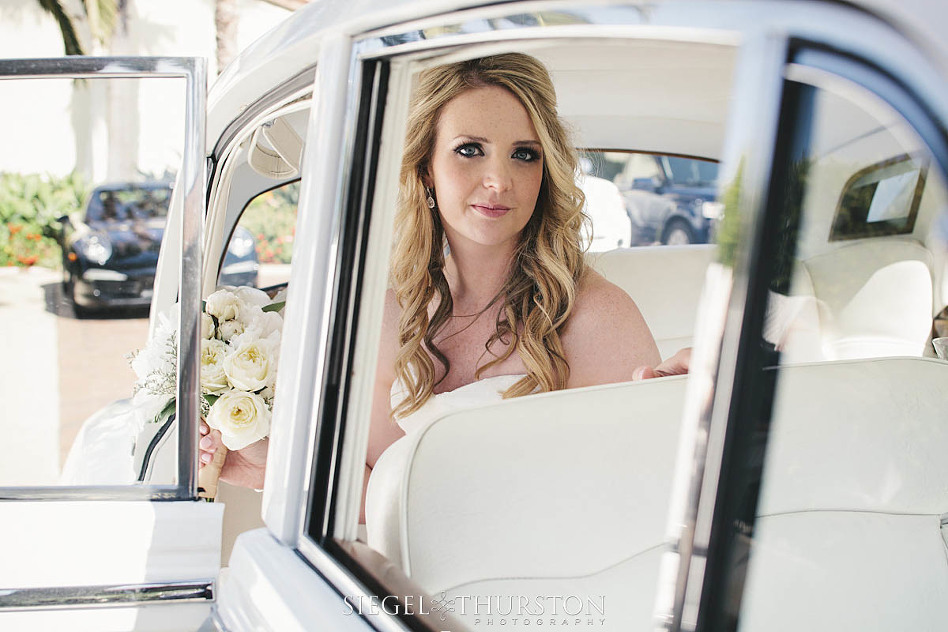 bride looking amazing in wedding Bentley