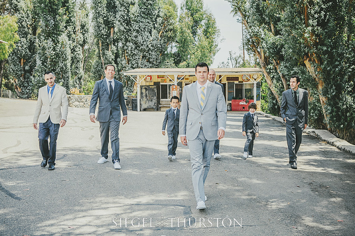 everybody loves a groomsmen walking shot