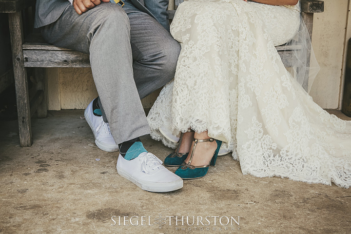 the groom matched his argyle socks with the bride