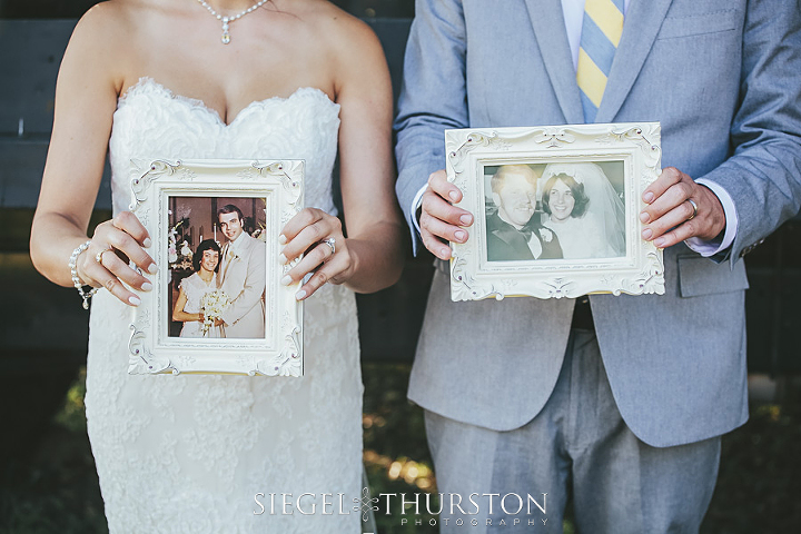 bride and groom holding up their parent