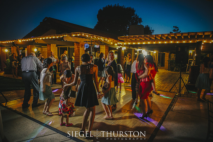 wedding guests getting down on the dance floor