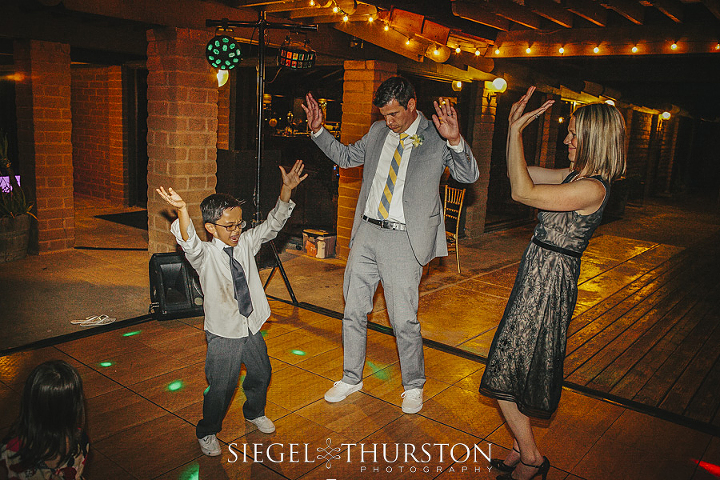 kids dancing to ymca at a wedding