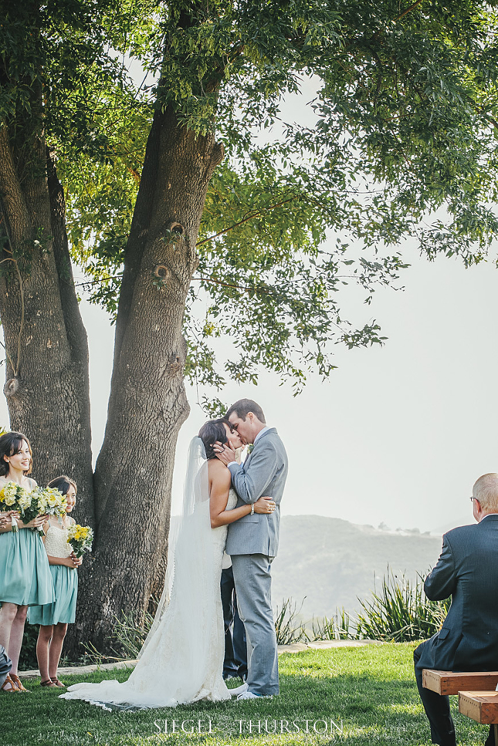 beautiful wedding ceremony kiss