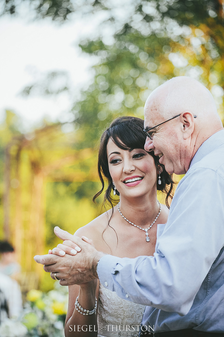 bride dancing with her father