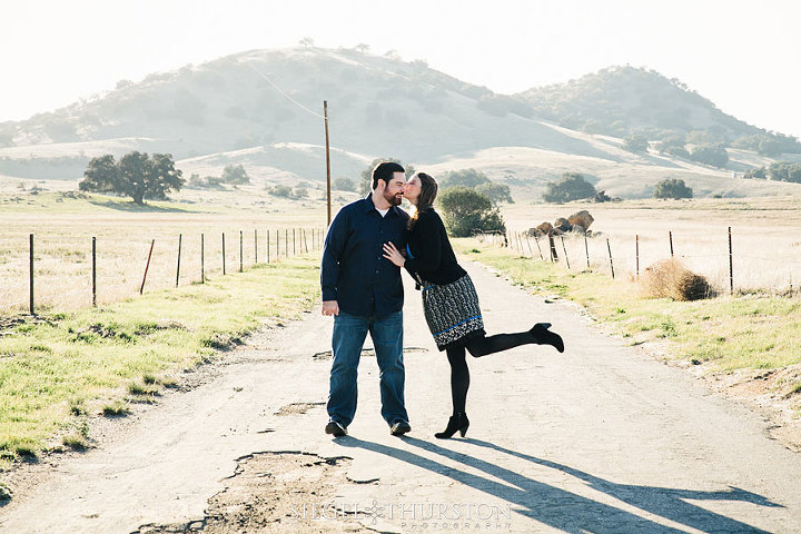 cute Julian california engagement photos down an old farm road