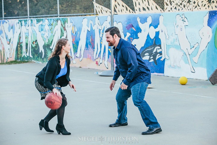 fun engagement photos of Kevin and Elyssa playing basket ball