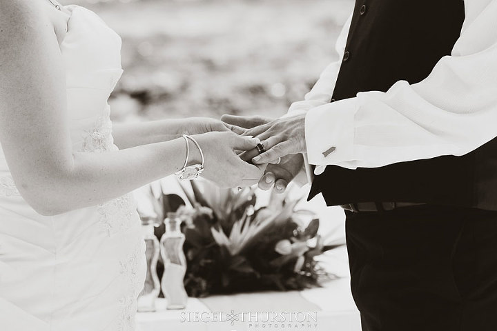 beach wedding exchanging of the rings