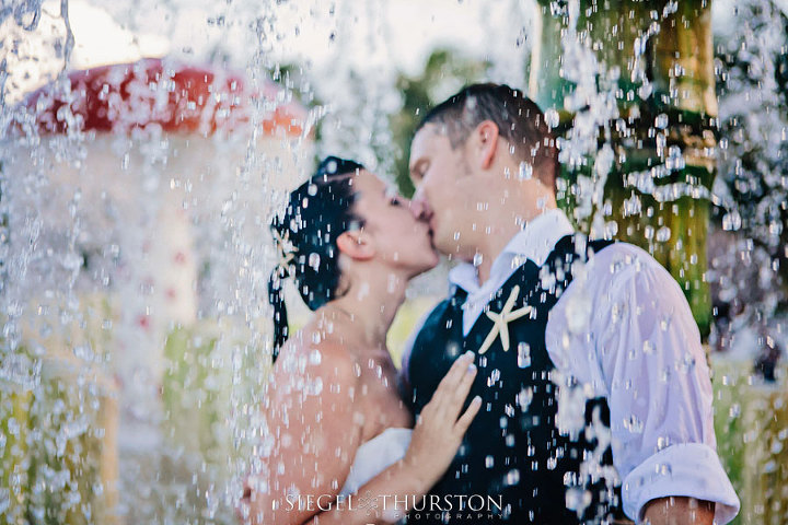 trash the dress under falling water