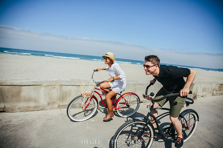 engagement photos with beach cruiser bikes in San Diego