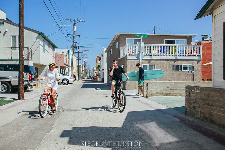 engagement photos with beach cruiser bikes in mission beach