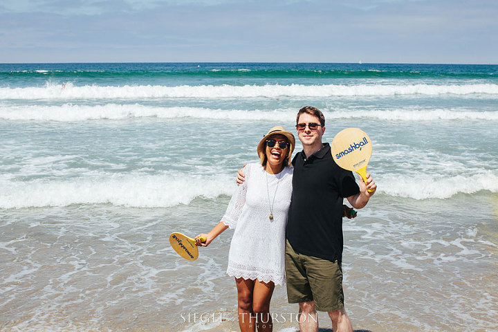 cute mission beach engagement session in the ocean