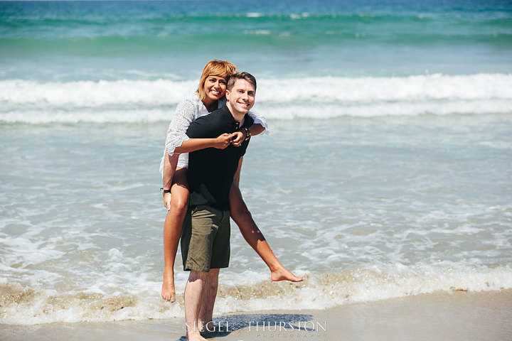cute mission beach engagement session in the ocean