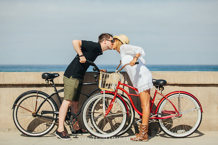 engagement photos with beach cruiser bikes in San Diego