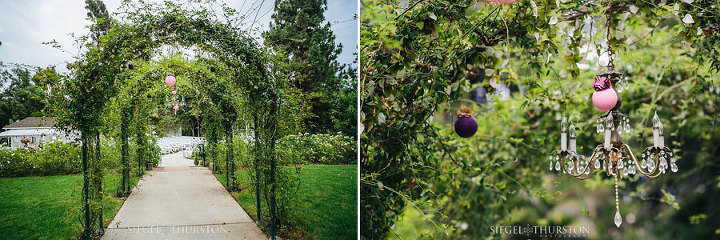 chandeliers hung from trees for wedding decoration