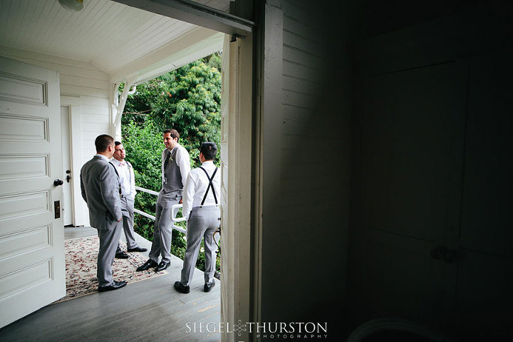groom and his groomsmen anxiously waiting for the wedding ceremony to begin at green gables estates