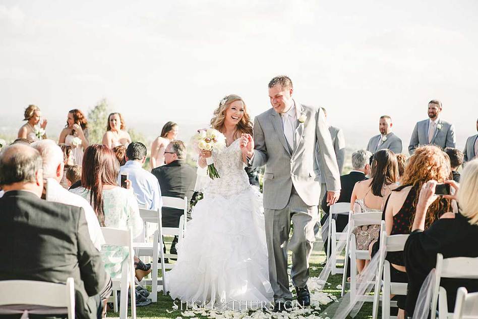 fun bride and groom wedding exit