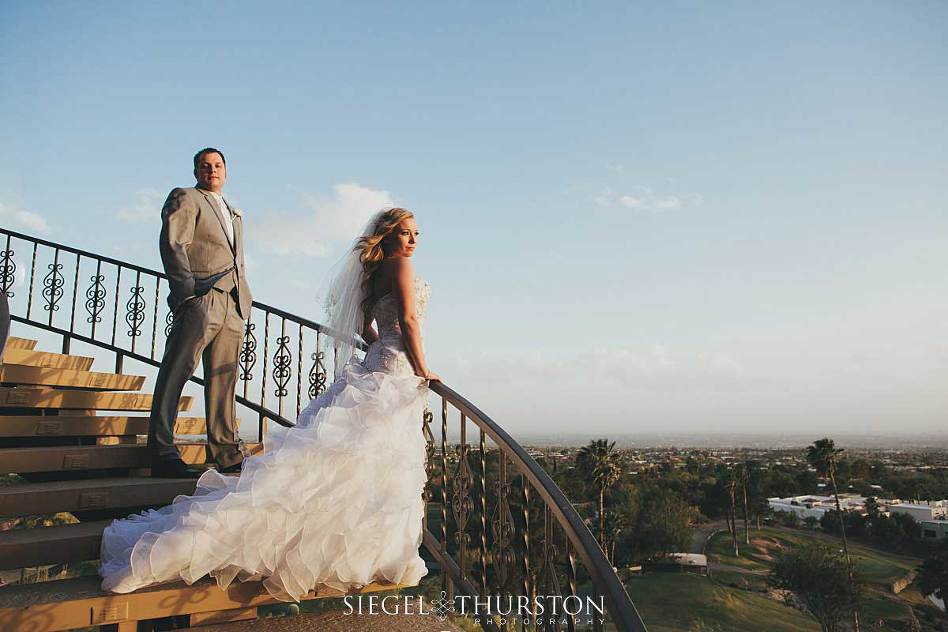 beautiful wedding photos on the outdoor staircase at skyline country club