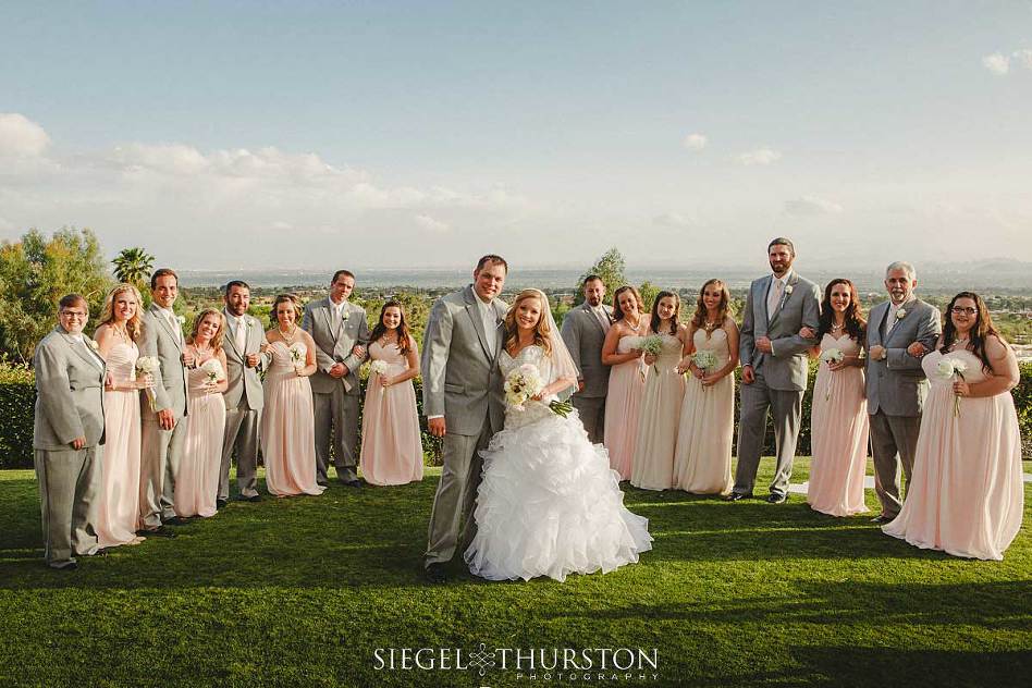 wedding party photo on the lawn at skyline country club after the wedding ceremony