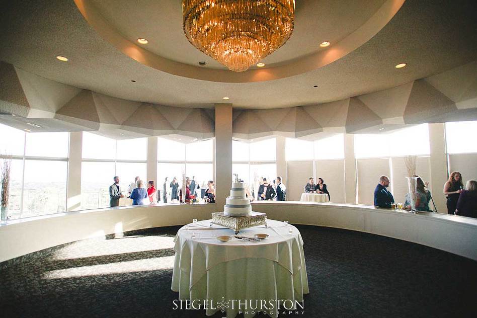 white and silver three tier wedding cake