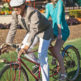 cute san diego engagement shoot with a couple riding a tandem bicycle