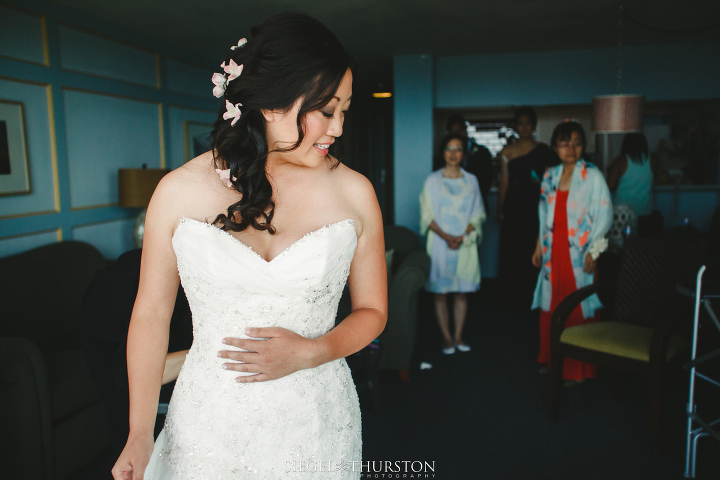 bride getting ready for her La jolla cove suites wedding in san  diego