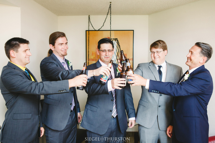 Groom and his brothers toasting before the wedding ceremony begins.