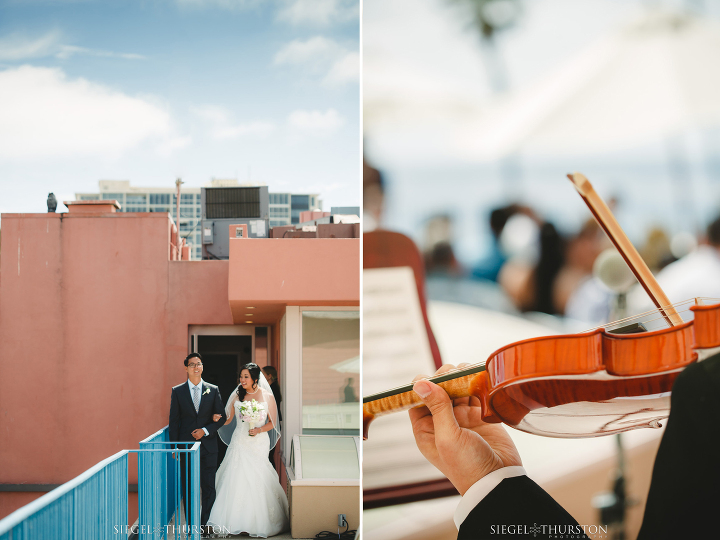 bride entering her rooftop wedding ceremony at the La Jolla Cove Suites 