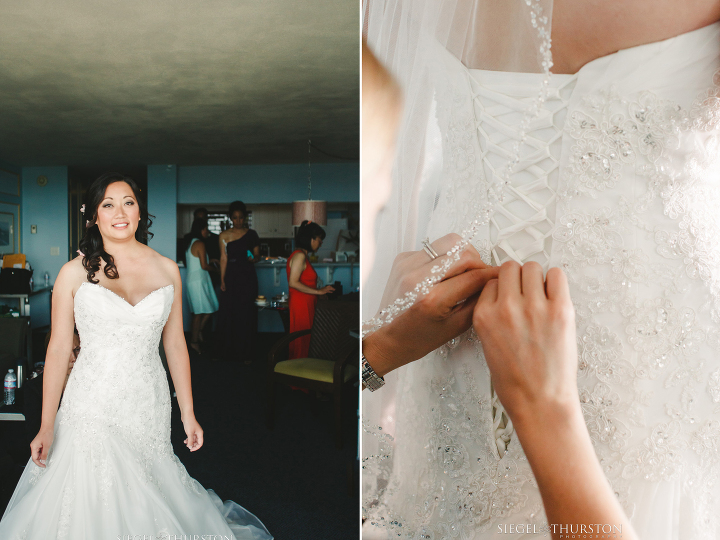 beautiful pictures of the bride getting her wedding dress laced up