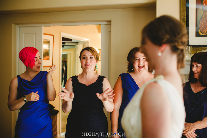 bridesmaids expressions as the bride gets ready