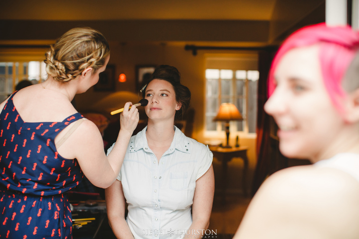 la jolla wedding bride getting her make up done