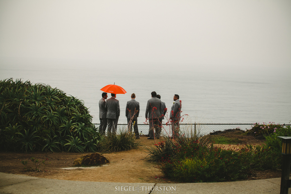 romantic rainy san diego wedding with umbrellas