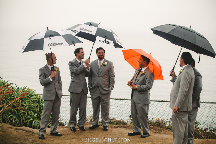 romantic rainy san diego wedding with umbrellas