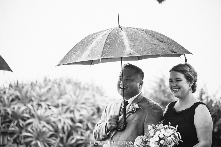 romantic rainy san diego wedding with umbrellas