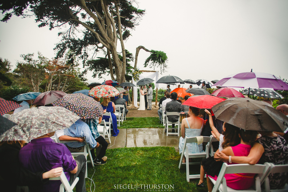 romantic rainy san diego wedding with umbrellas