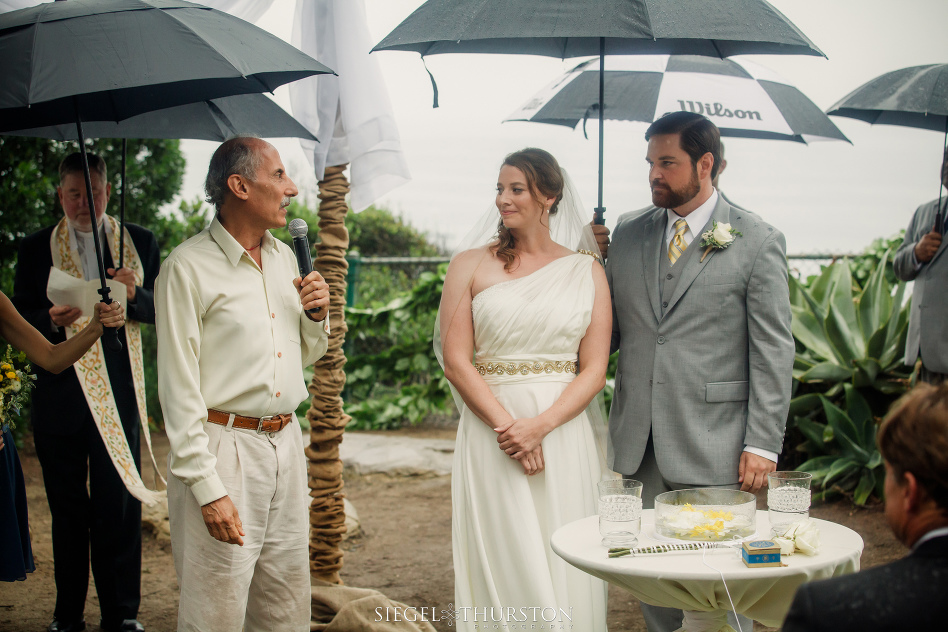 romantic rainy san diego wedding with umbrellas