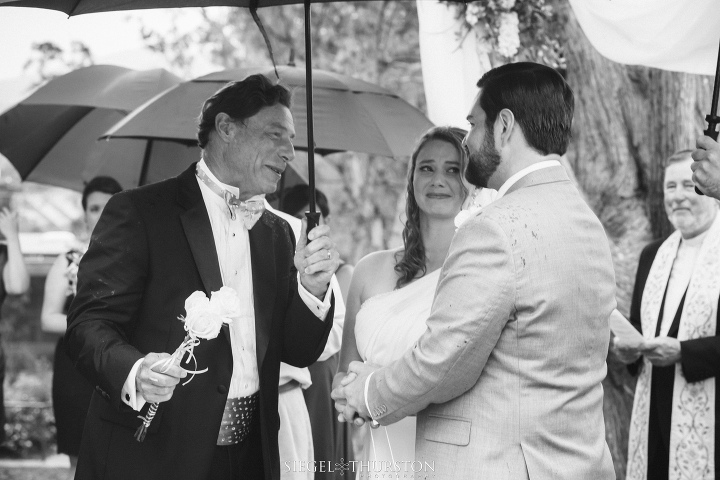 romantic rainy san diego wedding with umbrellas