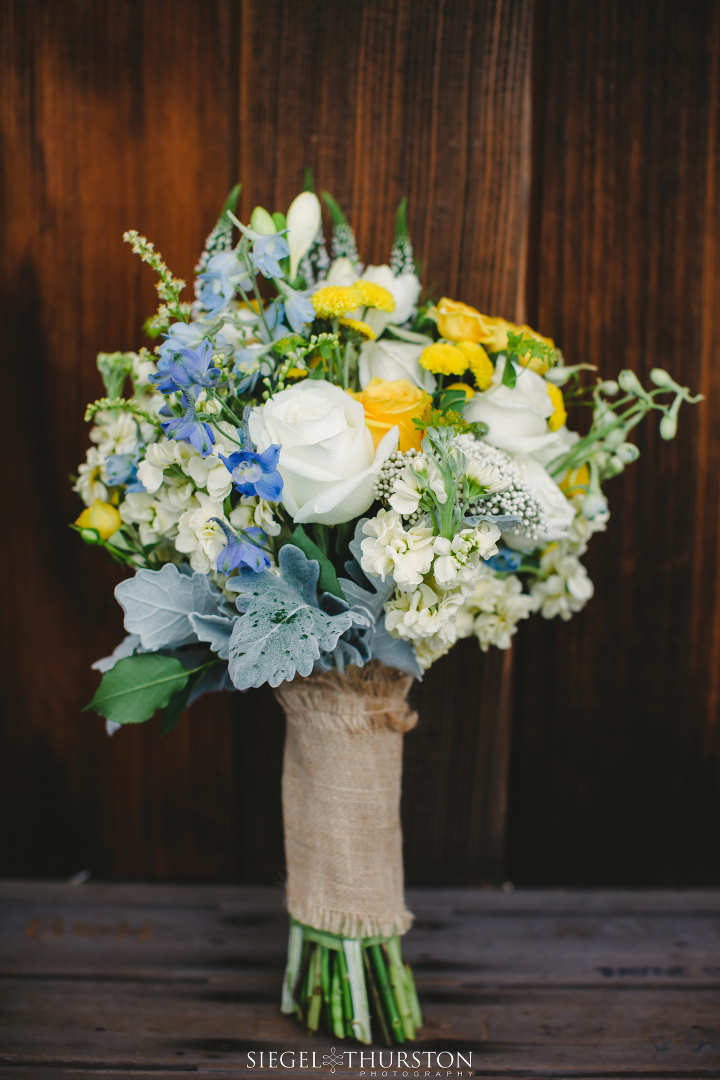 vintage and natural spring wedding bouquet with burlap
