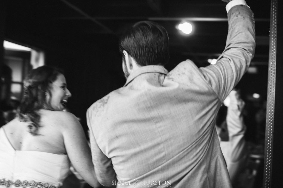 bride and groom entering their wedding reception san diego