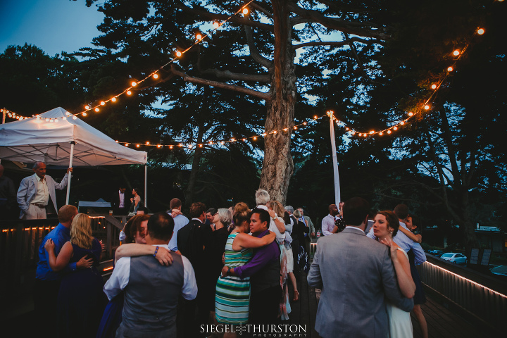 scripps la jolla outdoor wedding reception dancing under market lights