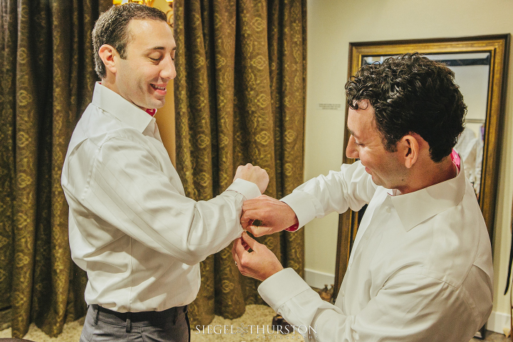 Dallas wedding groom and his groomsmen getting ready at the tailor