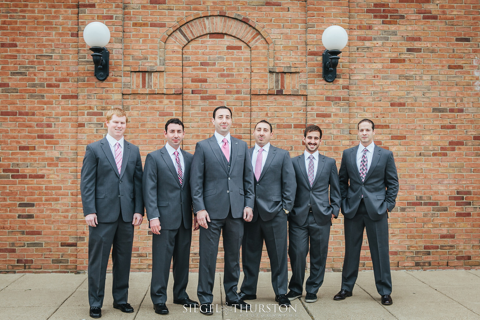 Groomsmen portraits at old brick building in Dallas Texas