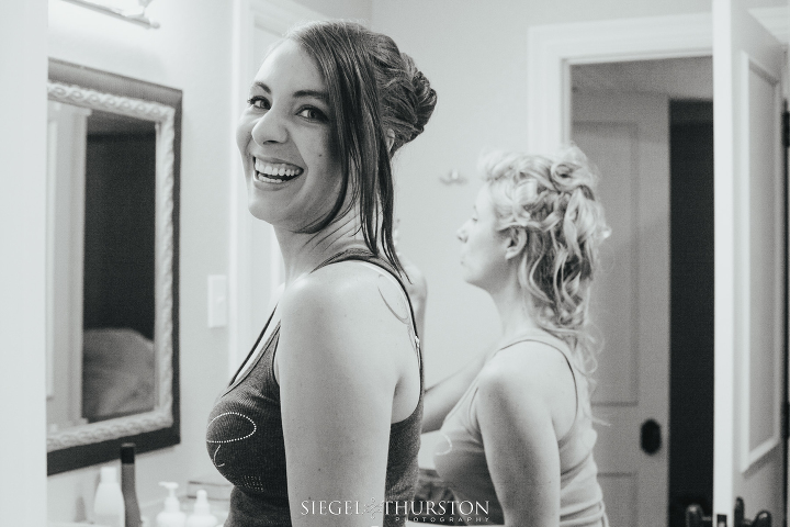 bridesmaids having fun getting ready for a wedding in Dallas Texas