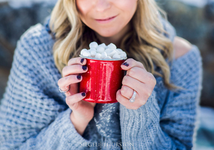 red enamel camping mug and engagement ring