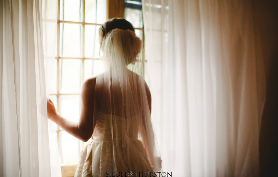 bride in the window at leo carrillo ranch